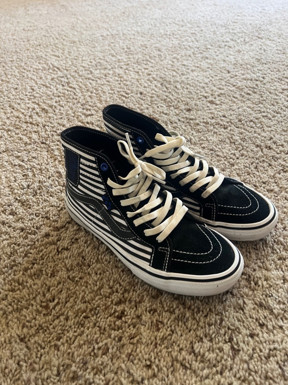 Vans Black and White High-Top Skate Sneakers